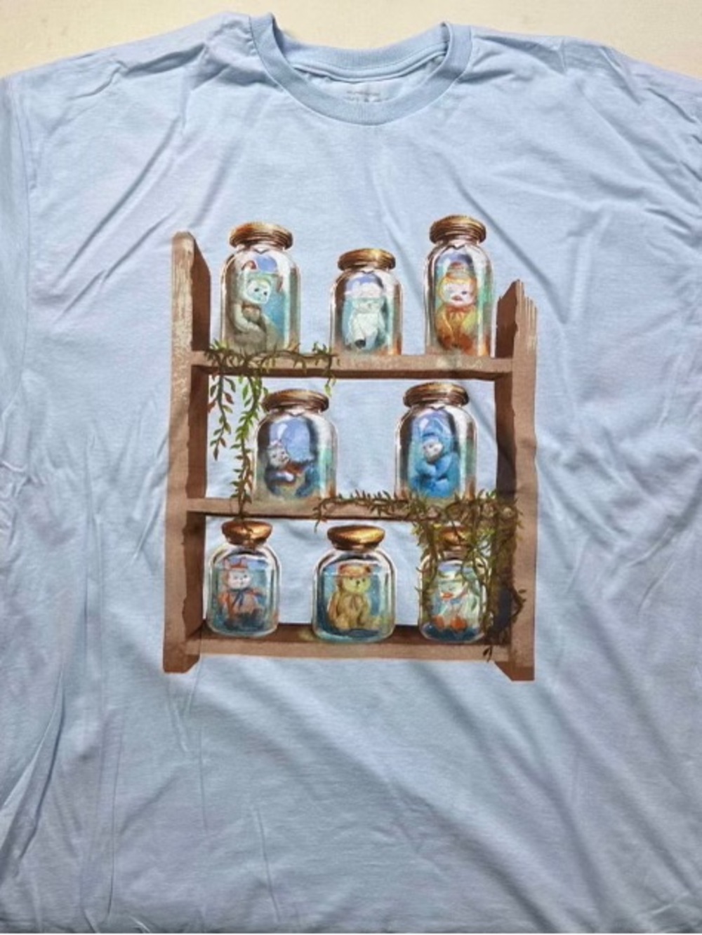Light Blue T-Shirt with Whimsical Jar Animal Print